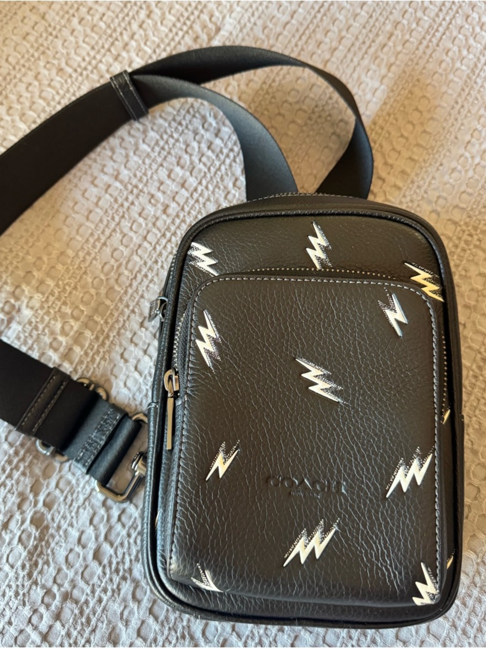 Coach Black Leather Crossbody Bag with Embossed Lightning Bolt Print